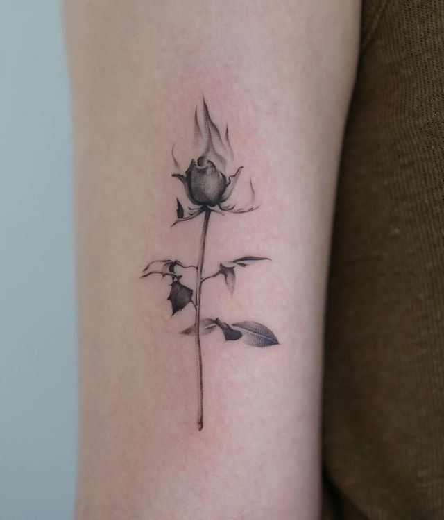 Black Rose on Fire Tattoo on Arm