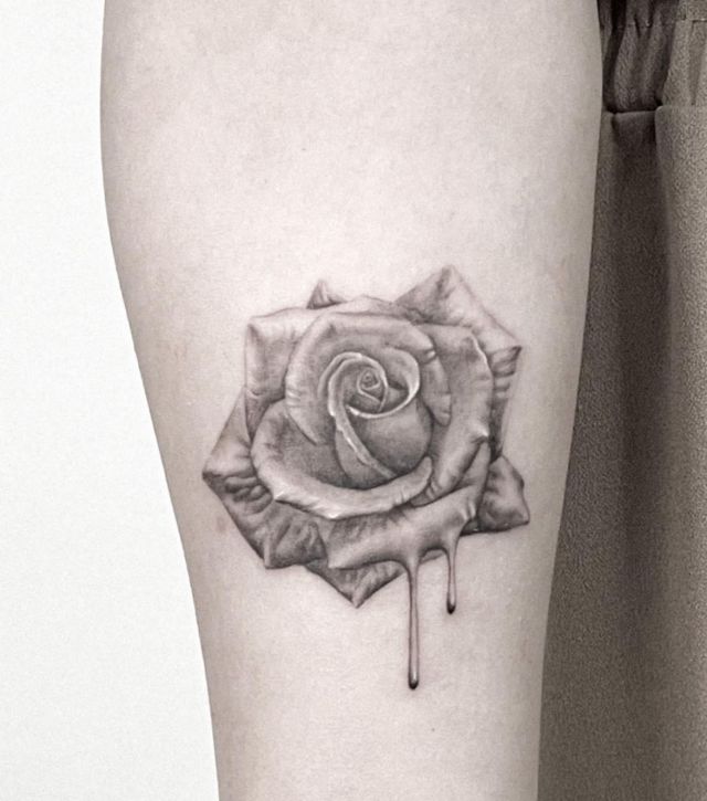 Dripping White Rose Tattoo on Arm