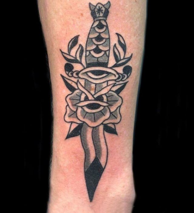 Black Dagger Eye Tattoo on Leg