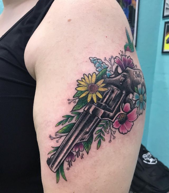 Flowers Bird and Revolver Tattoo on Shoulder