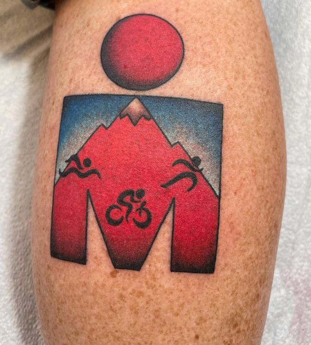 Unique Ironman Triathlon Tattoo on Leg
