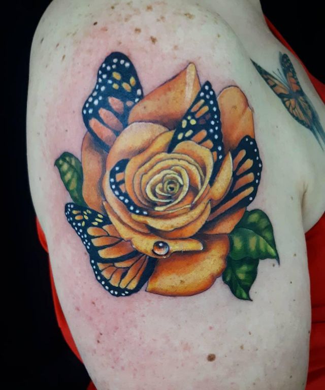 Pretty Orange Rose Tattoo with Butterfly on Shoulder