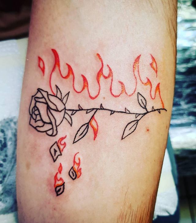 Simple Rose on Fire Tattoo on Leg