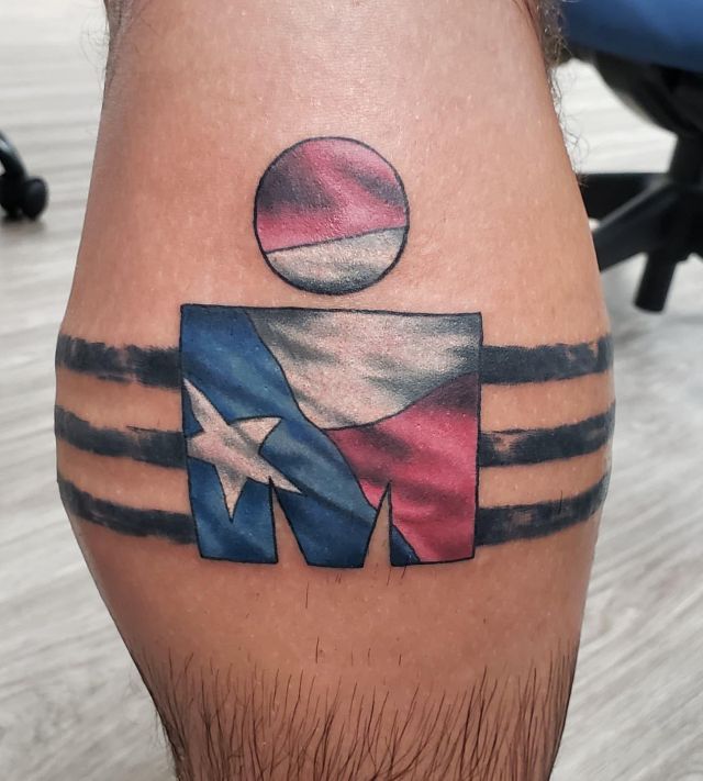 Ironman Triathlon Tattoo with American Flag on Leg
