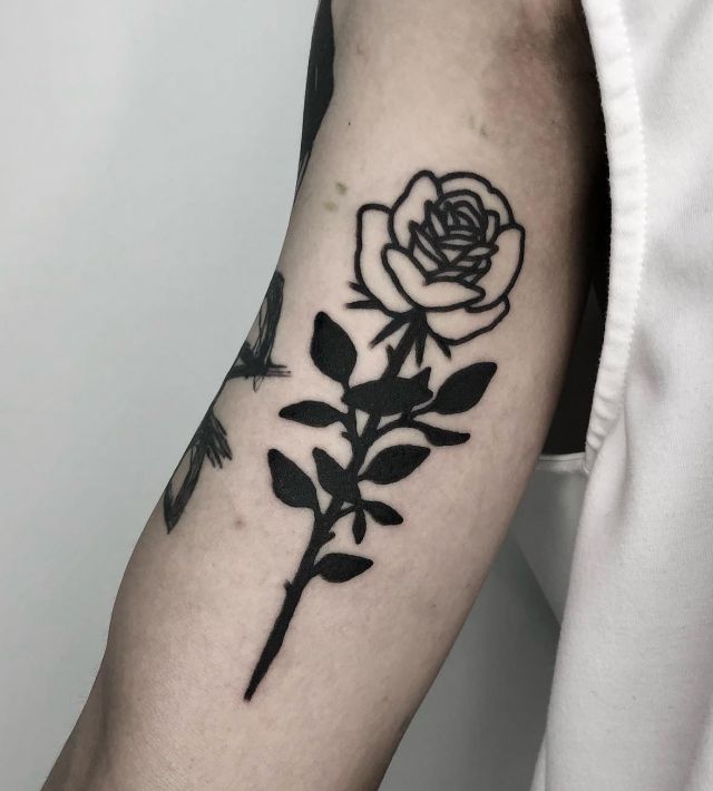 Delicate White Rose Tattoo on Upper Arm