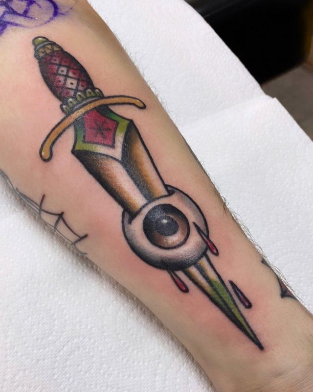 Unique Dagger Eye Tattoo on Forearm