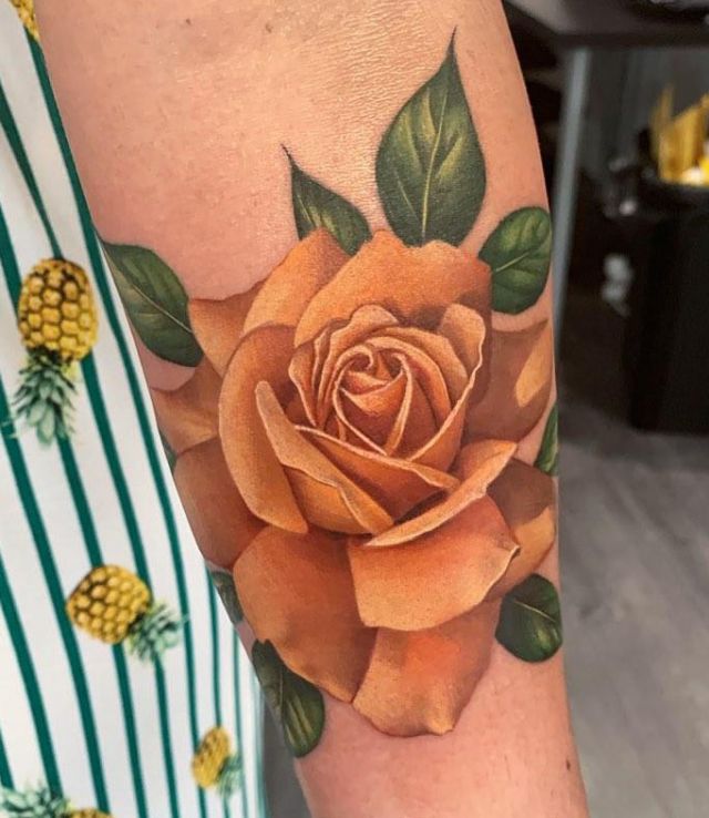 Elegant Orange Rose Tattoo on Arm