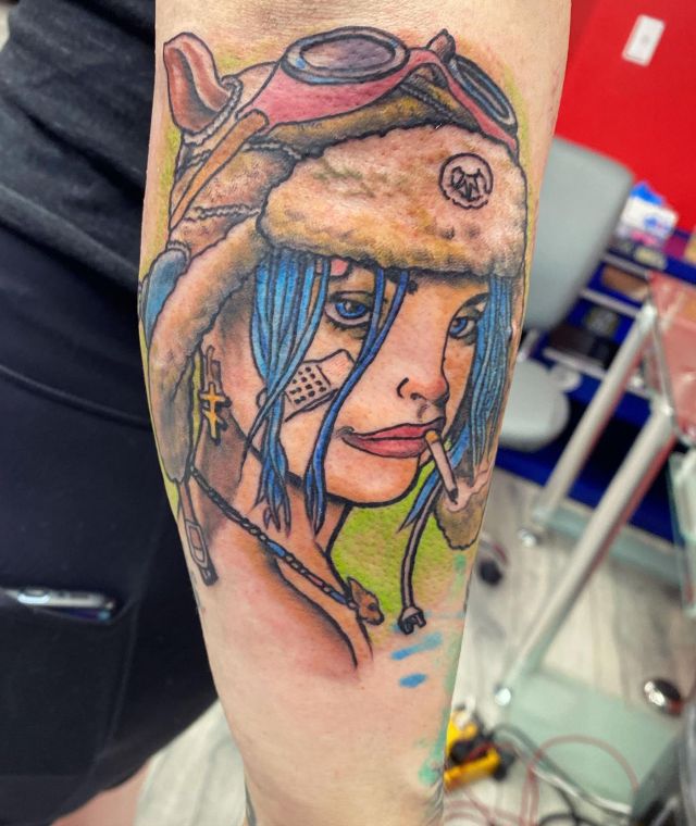 Unique Tank Girl Tattoo on Arm