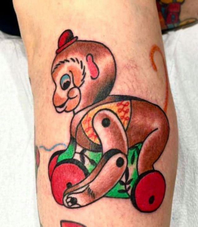 Cute Monkey Toy Tattoo on Leg