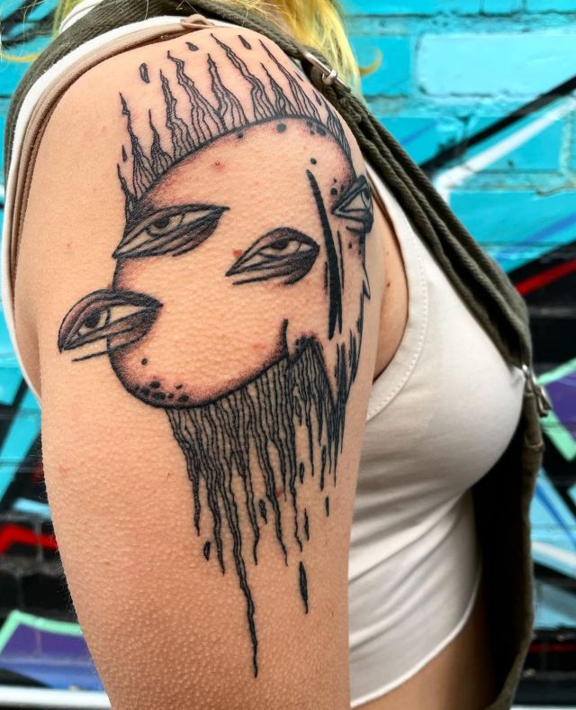 Abstract Character Shoulder Cap Tattoo