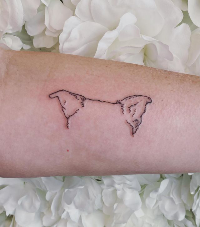 Unique Dog Ear Tattoo on Forearm