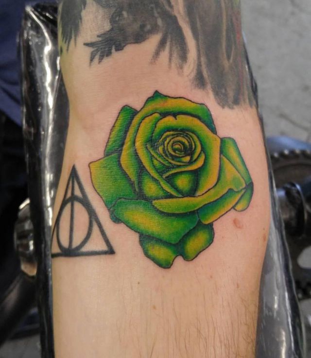 Elegant Green Rose Tattoo on Leg