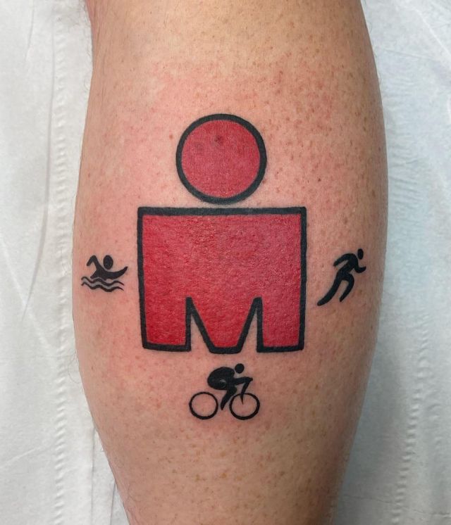 Red Ironman Triathlon Tattoo on Leg