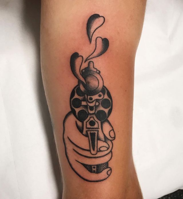 Revolver Tattoo with Heart on Leg
