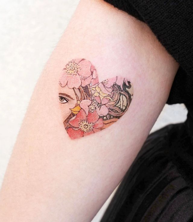 Unique Heart-shaped Alphonse Mucha Tattoo on Arm