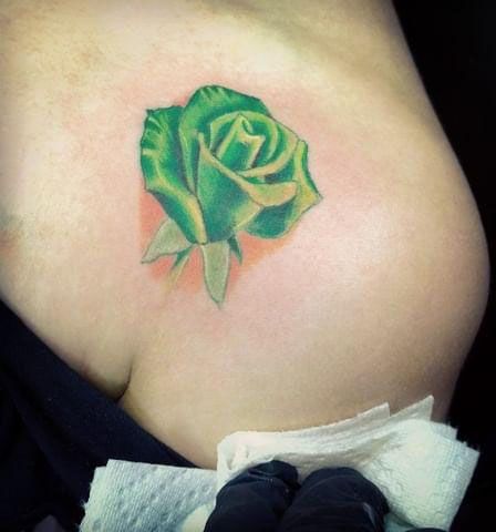 Elegant Green Rose Tattoo on Shoulder