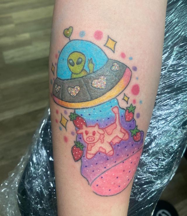 UFO Strawberry Cow Tattoo on Arm
