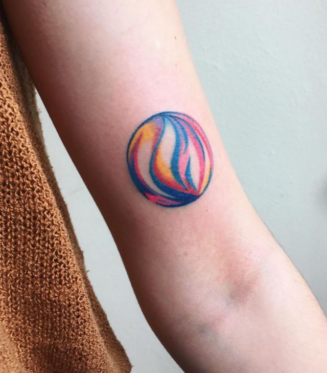 Round Agate Tattoo on Upper Arm