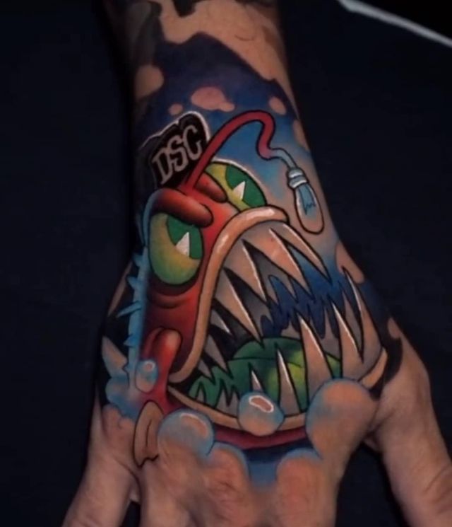 Colored Angler Fish Tattoo on Hand