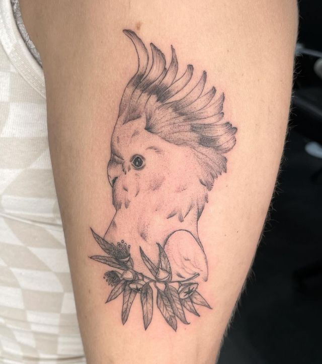 Elegant Cockatoo Tattoo on Upper Arm