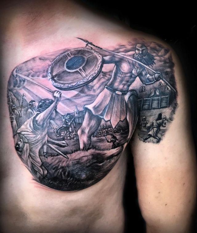 Unique David and Goliath Tattoo on Chest