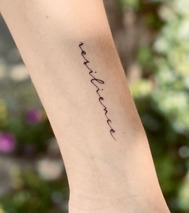 Pretty Resilience Tattoo on Forearm