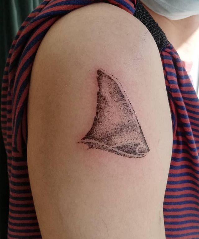 Elegant Shark Fin Tattoo on Shoulder
