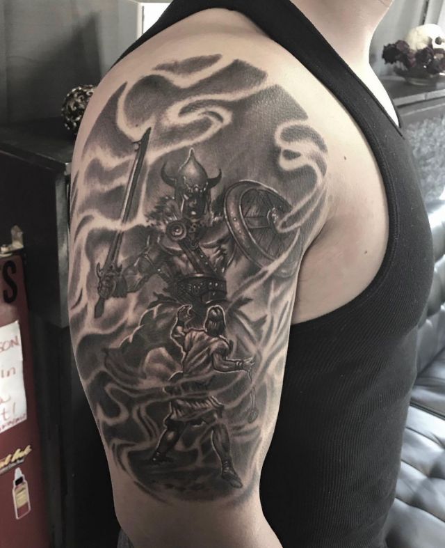 Amazing David and Goliath Tattoo on Shoulder