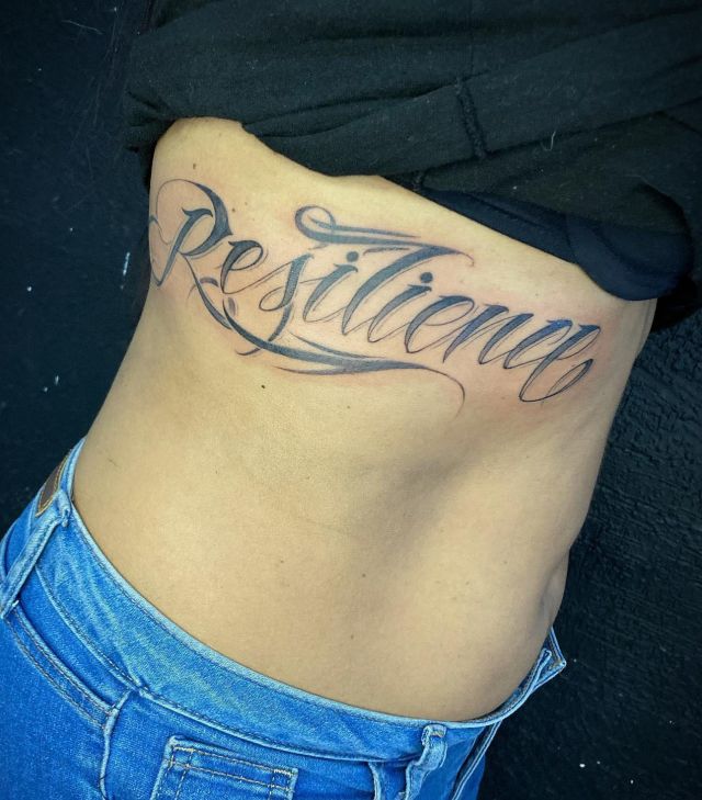 Unique Resilience Tattoo on Rib