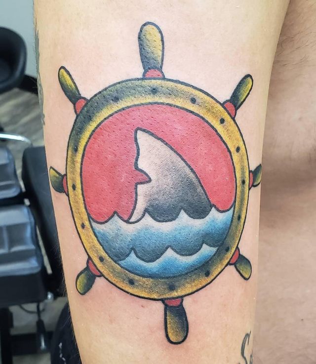 Helm Shark Fin Tattoo on Upper Arm