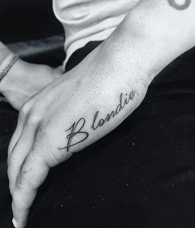 Blondie Side Hand Tattoo