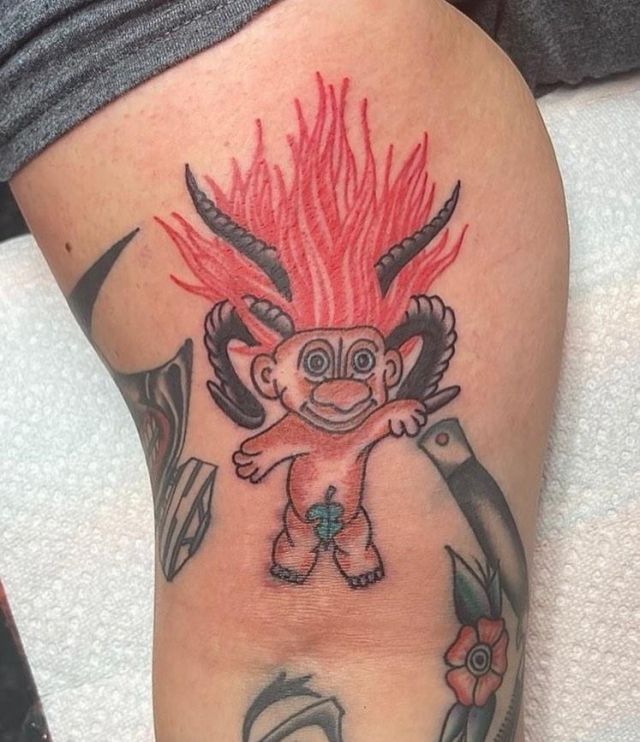 Unique Troll Tattoo on Arm