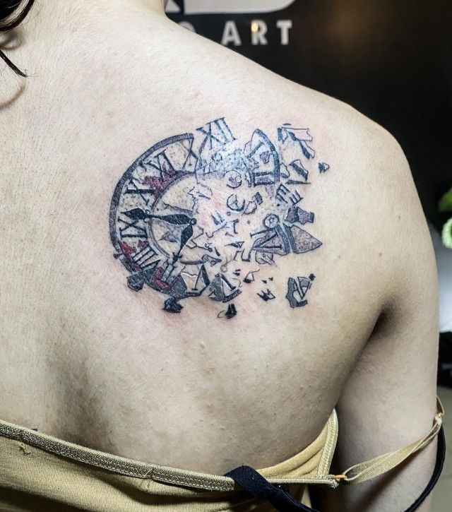 Unique Broken Clock Tattoo on Back