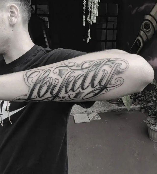 Elegant Loyalty Tattoo on Arm