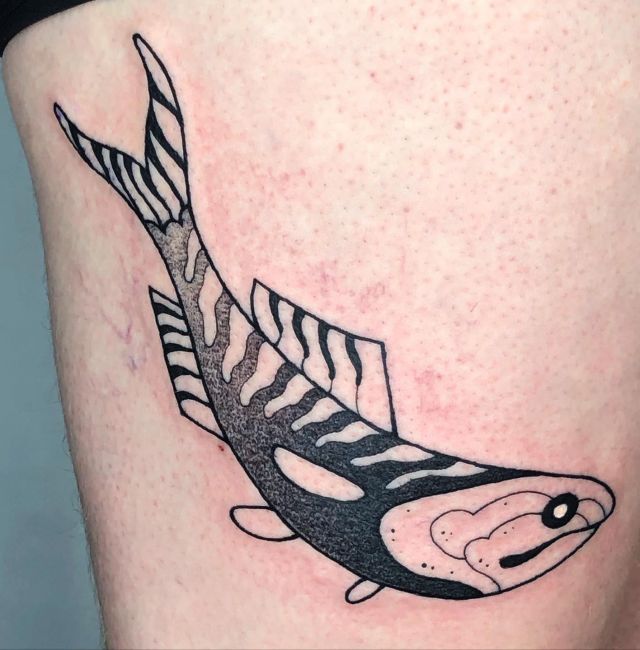 Elegant Anchovy Tattoo on Thigh