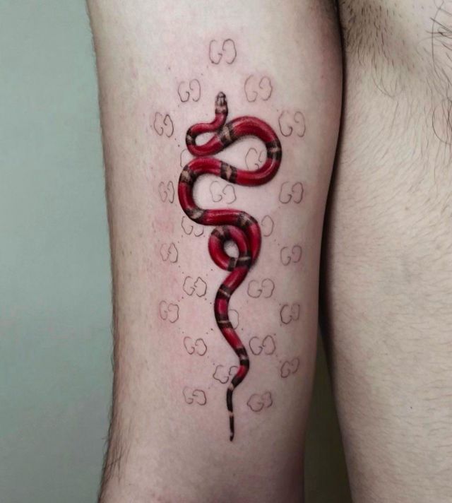 Elegant Gucci Snake Tattoo on Arm