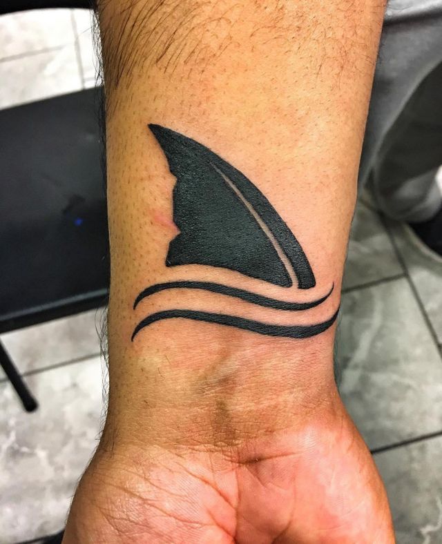 Unique Shark Fin Tattoo on Wrist