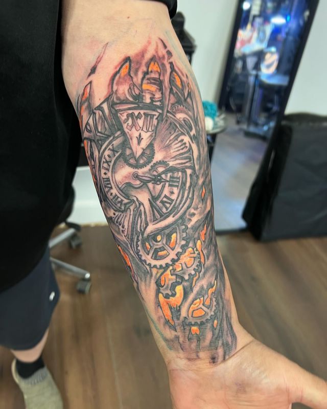 Fire Broken Clock Tattoo on Arm