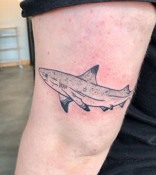 Elegant Reef Shark Tattoo on Upper Arm