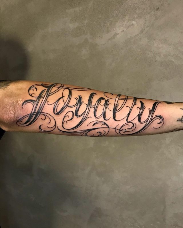 Unique Loyalty Tattoo on Arm