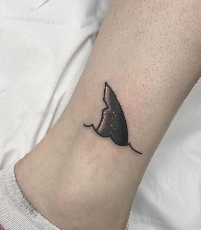 Elegant Shark Fin Tattoo on Ankle