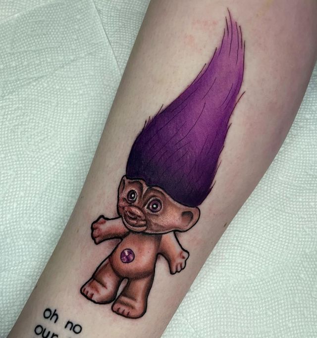 Unique Purple Hair Troll Tattoo on Leg