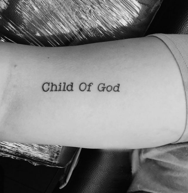 Small Child Of God Tattoo on Arm