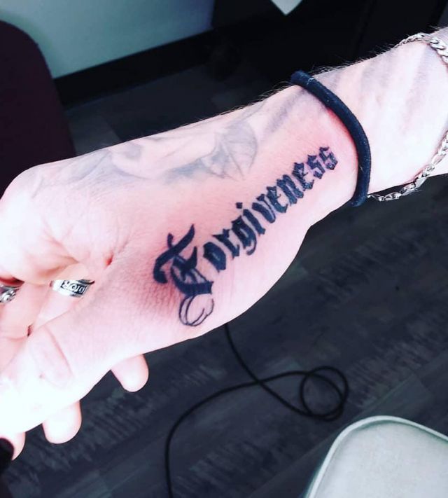 Pretty Forgiveness Tattoo on Hand