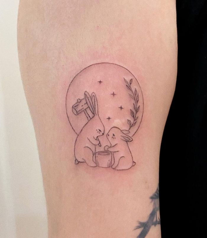 Moon and Two Rabbits Tattoo on Arm