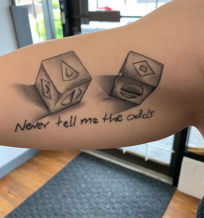 Dice Never tell me the odds Tattoo on Upper Arm