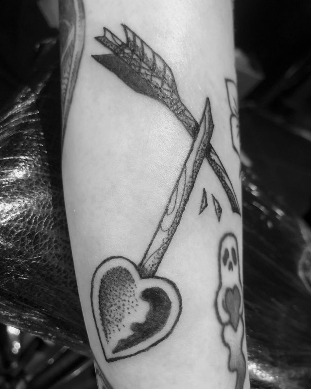 Broken Arrow Tattoo with Heart on Forearm