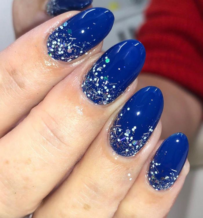 Festive Oval Blue Christmas Nail Art