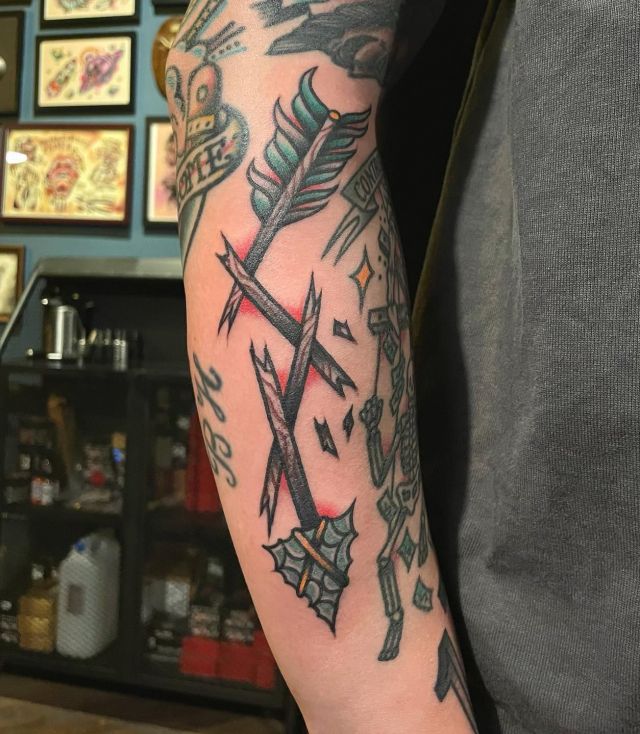 Pretty Broken Arrow Tattoo on Arm