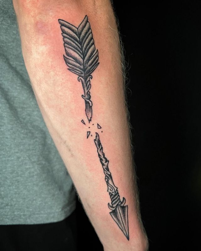 Pretty Broken Arrow Tattoo on Forearm